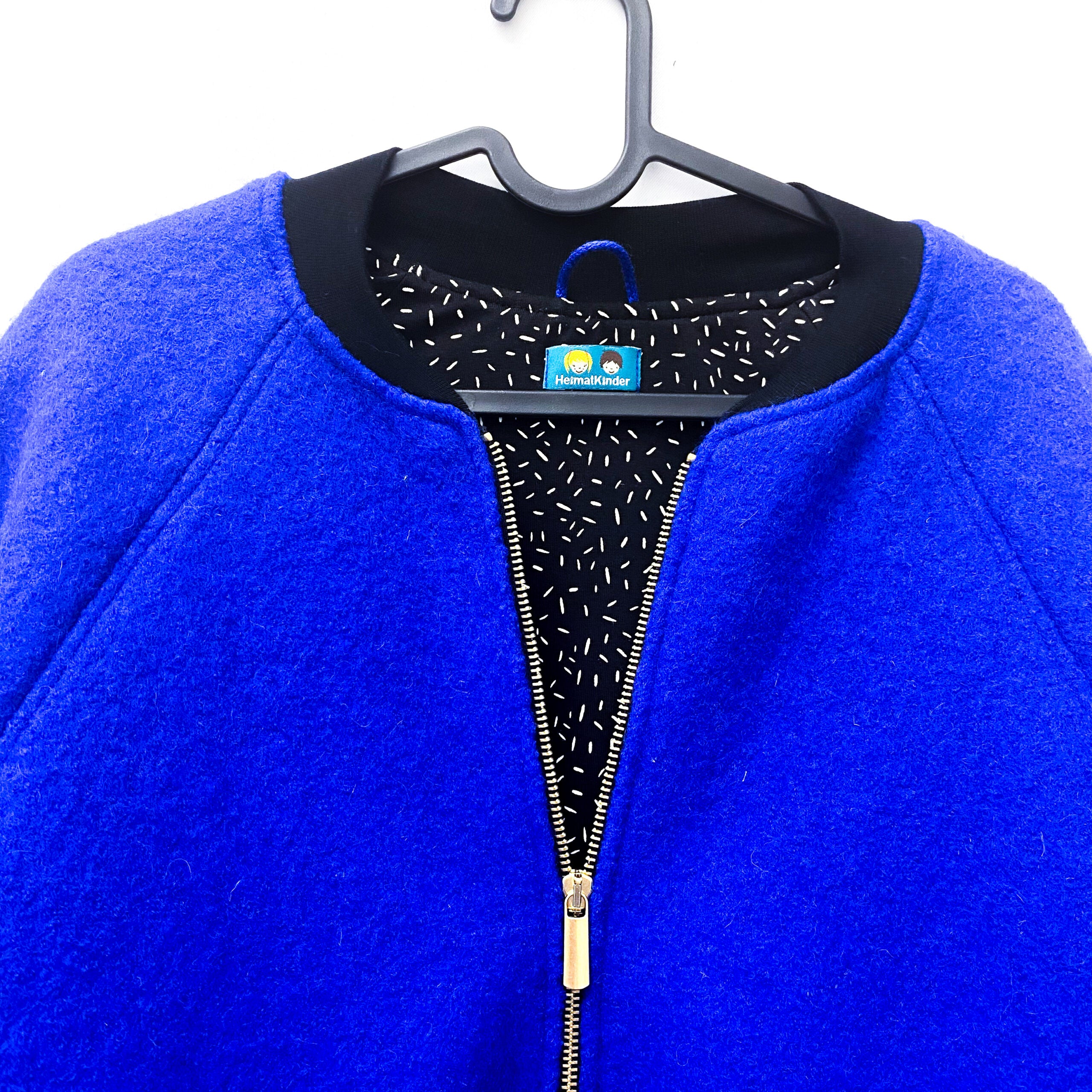 Bomberjacke Wollwalk knallblau/schwarz mit Stippchen