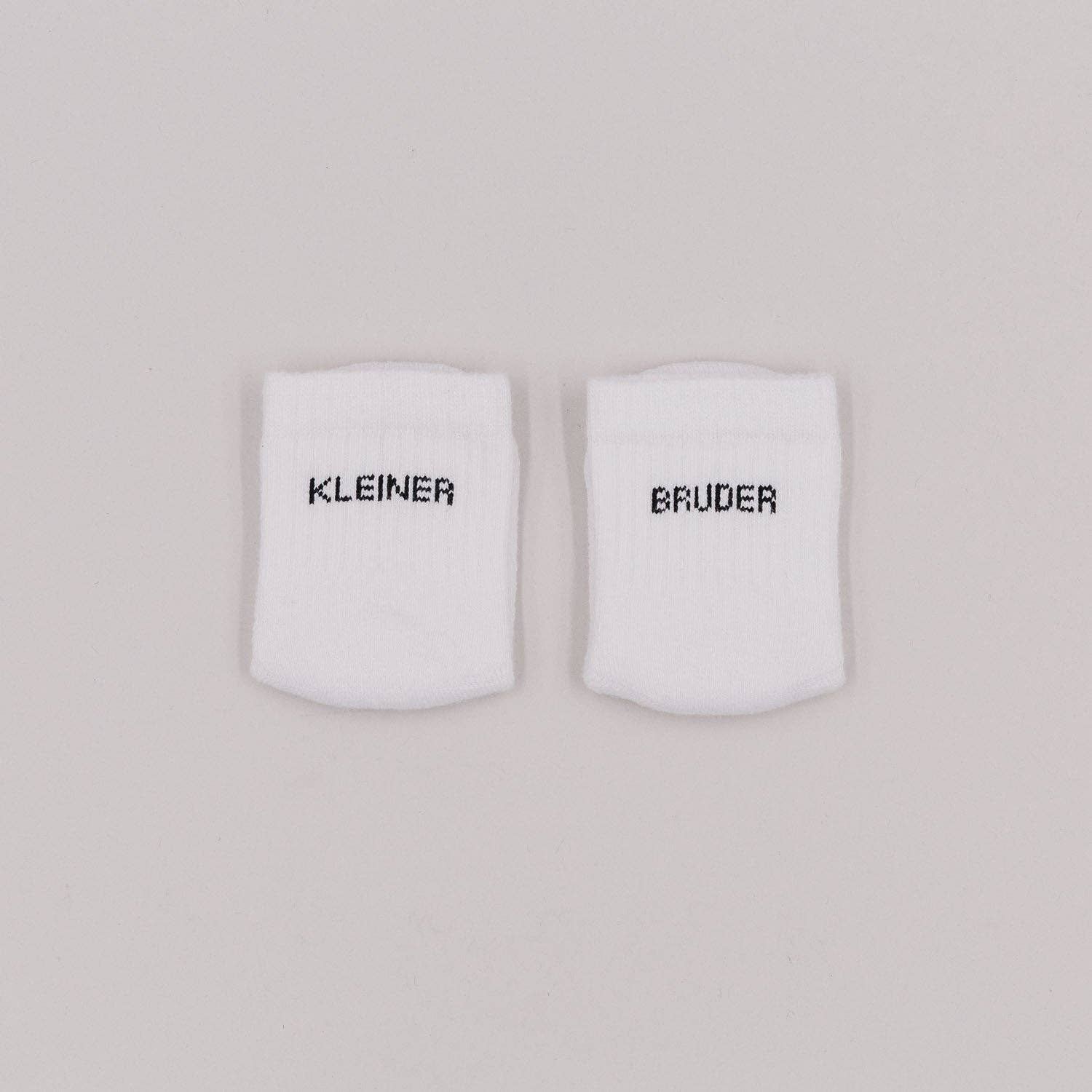 Eulenschnitt - Babysocken "Kleiner Bruder"